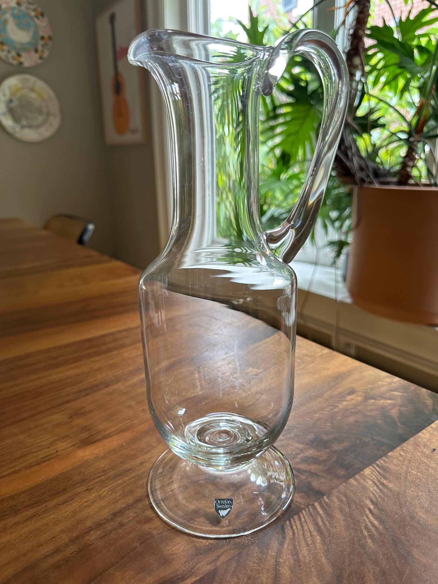 Tall Orrefors crystal water pitcher