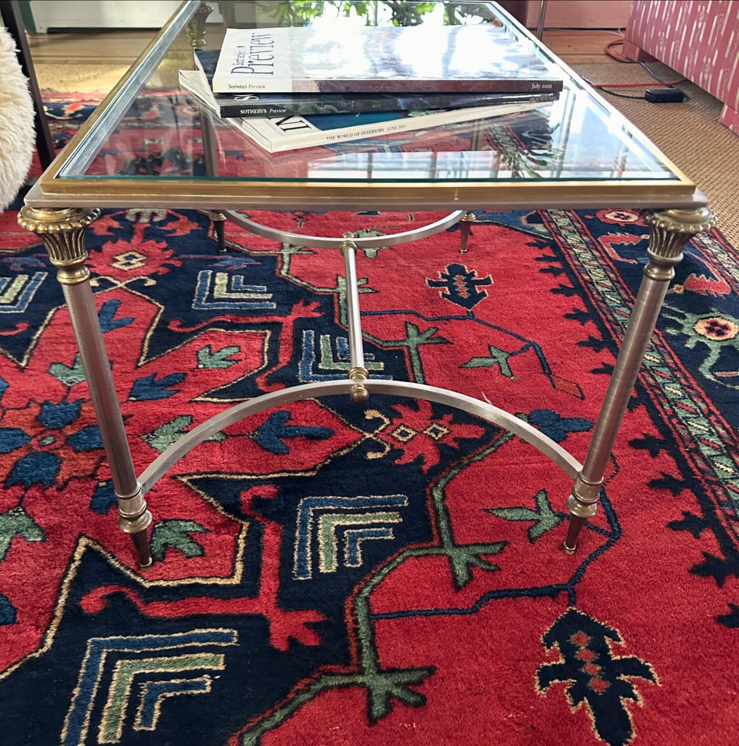 Excellent vintage Regency glass top coffee table, brass and steel frame is heavy and high quality